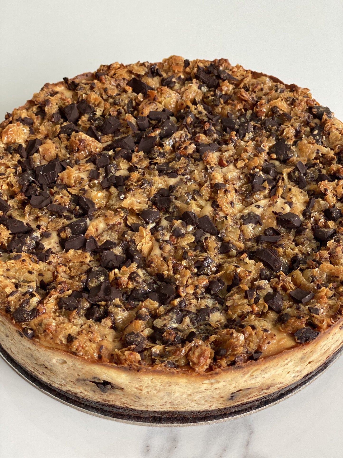 a whole chocolate and baklava cheesecake